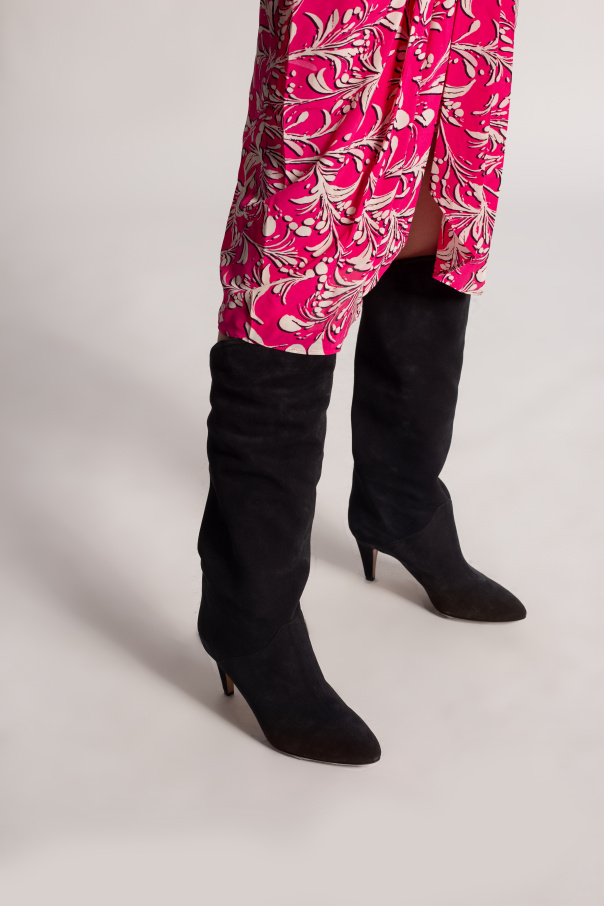 Black Laylis heeled boots Isabel Marant SchaferandweinerShops Sweden A closer look at Chrissy Teigen wearing snake embossed leather boots courtesy of Schutz